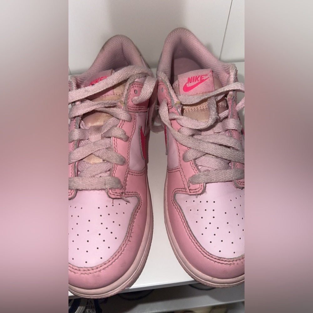 Nike triple pink dunks.  In good used condition.
